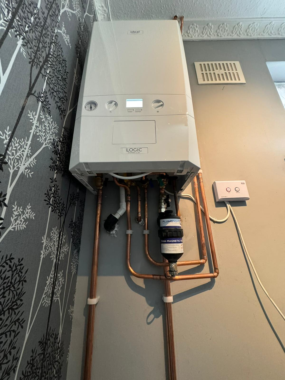 Ideal Logic Combi C30 boiler installed on new copper pipework with a magnetic system filter