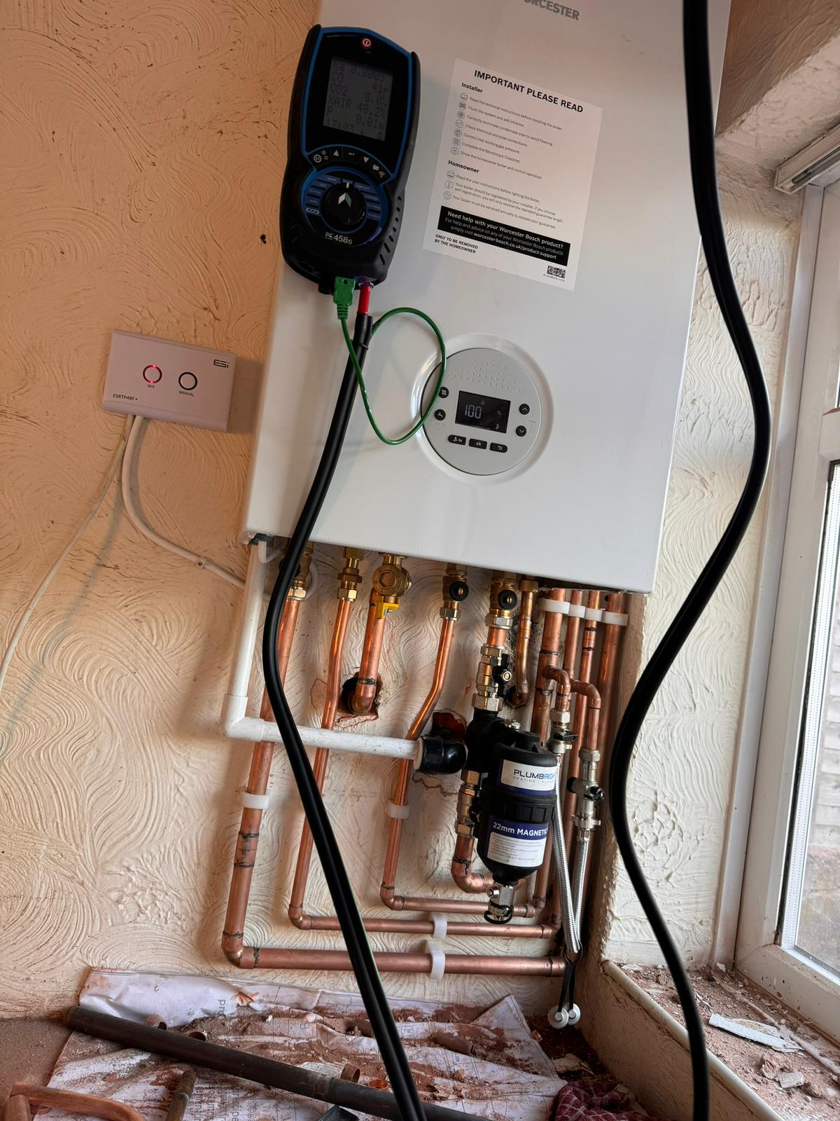 Worcester Bosch combi boiler installed and being commissioned by ProGas247, on new copper pipework with a magnetic filter